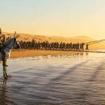 Christopher Nolan's The Odyssey trailer screenshot showing the full-sized Trojan Horse during the film's practical production.